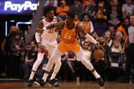 Covington defending against the Phoenix Suns' DeAndre Ayton earlier this month